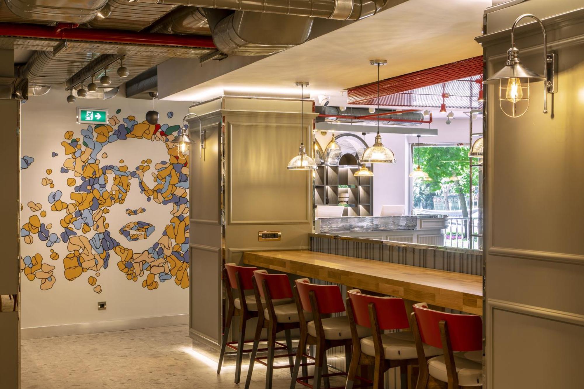 Stayso The House Hotel Istanbul Exteriör bild The interior of a Starbucks Reserve store in London